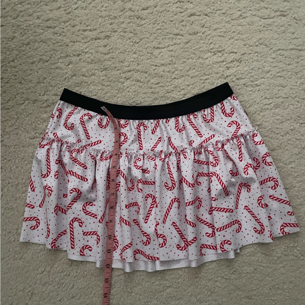 Sparkle Athletic running skirt, candy canes design. Size small.
